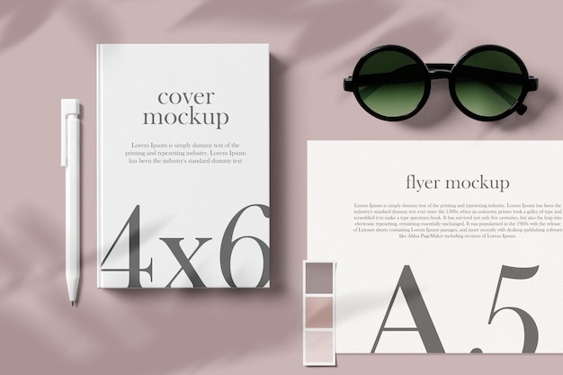 Clean minimal book 4x6 mockup on clean wallpaper with glasses pen and a5 paper PSD file