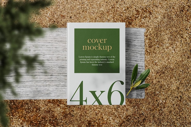 PSD clean minimal book 4x6 mockup on top wooden bench with plant