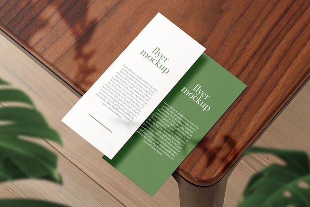 Clean minimal business card and flyer mockup on background with flower