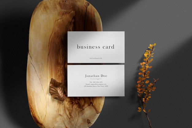 Clean minimal business card mockup on wood plate