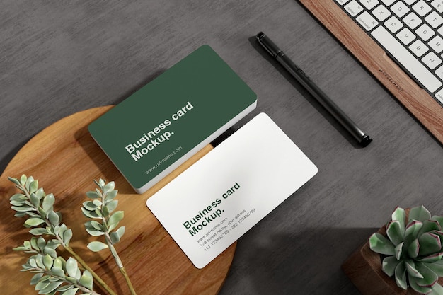 Clean minimal business card mockup on wood small plate