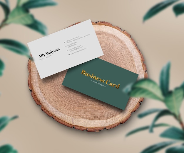 Clean minimal business card on wood cut natural and tropical background logo mockup premium psd