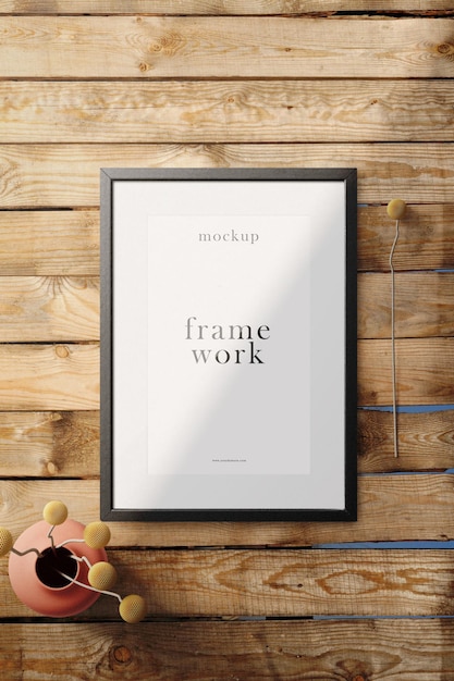 Clean minimal frame mockup on the top wood with vase