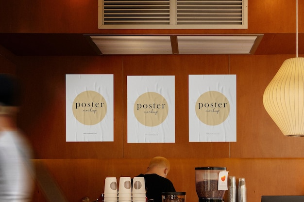 Clean minimal poster mockup on cafe background with people walking pass