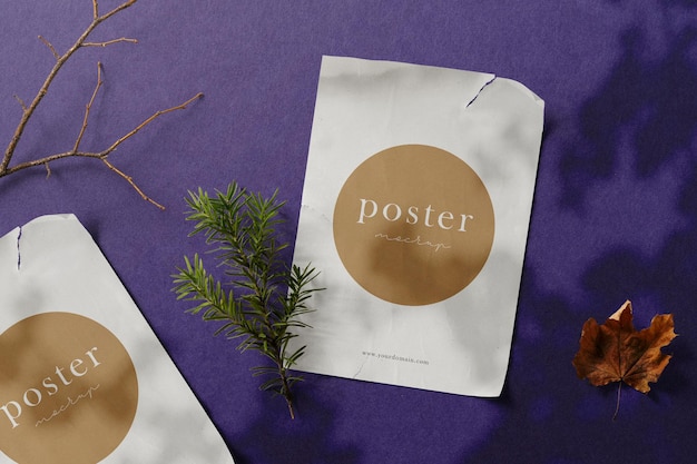 Clean minimal poster mockup on top background with stick and maple. psd file.