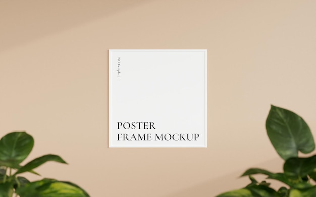 Clean and minimalist front view square white photo or poster frame mockup hanging on the wall with blurry plant 3d rendering