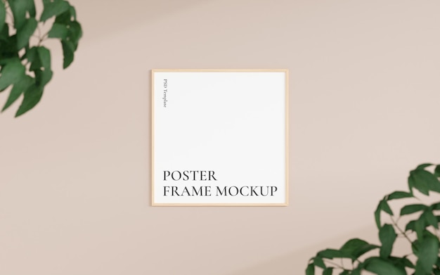 Clean and minimalist front view square wooden photo or poster frame mockup hanging on the wall with blurry plant 3d rendering