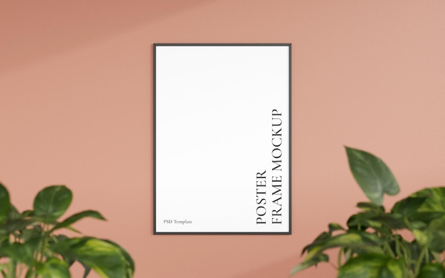 Clean and minimalist front view vertical black photo or poster frame mockup hanging on the wall with blurry plant 3d rendering