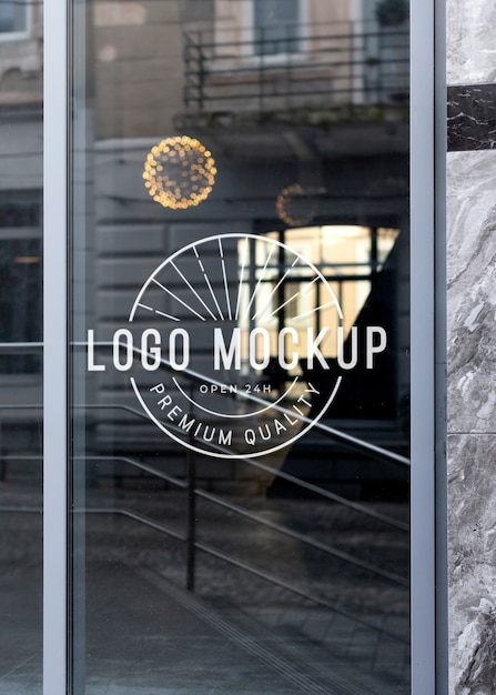 Clear glass window with business logo mock-up