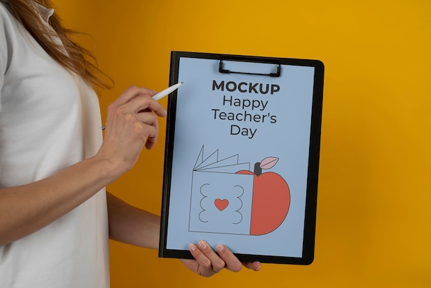 clipboard with female teacher for teachers day celebration