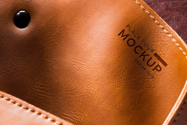 close-up of brown leather with button