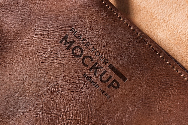 Close-up of brown leather with stitches