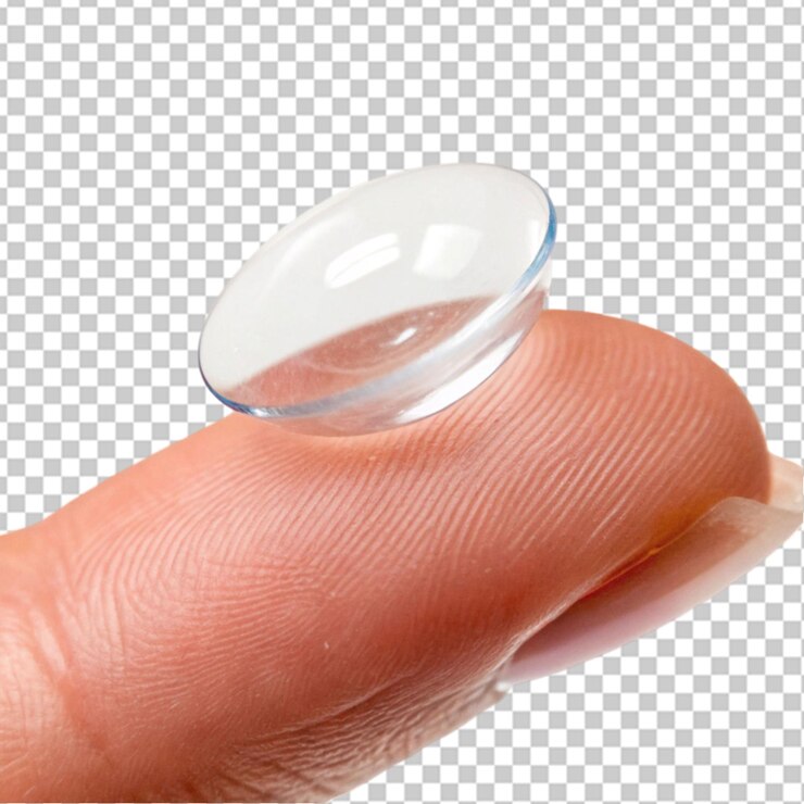 PSD close up of a clear contact lens on a fingertip on transparent background
