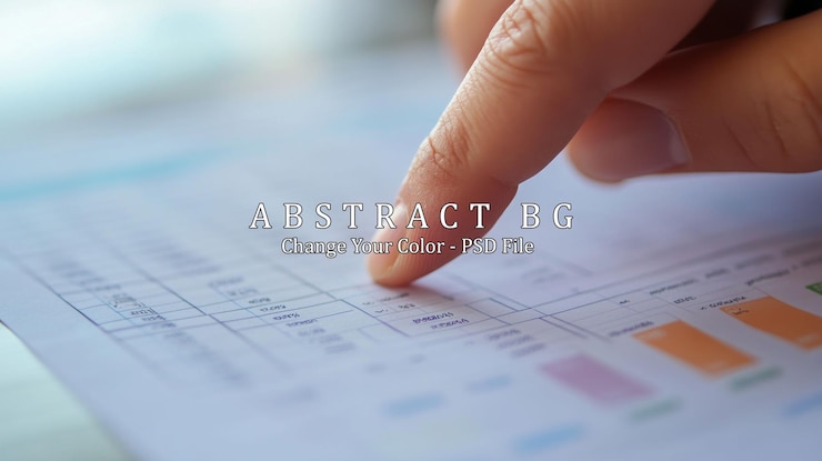 PSD close up of a finger pointing at a spreadsheet