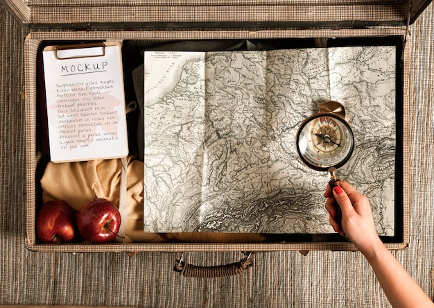 PSD close-up hand holding magnifying glass