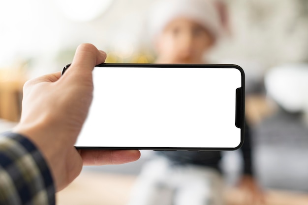 PSD close-up of a hand holding a mobile phone