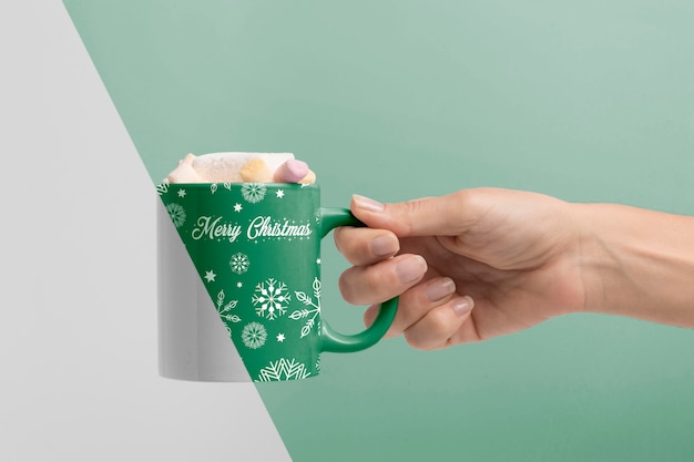 Close-up hand holding mug