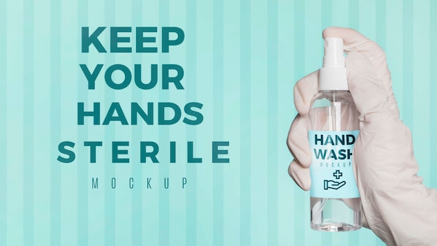 PSD close-up hand holding sanitizer