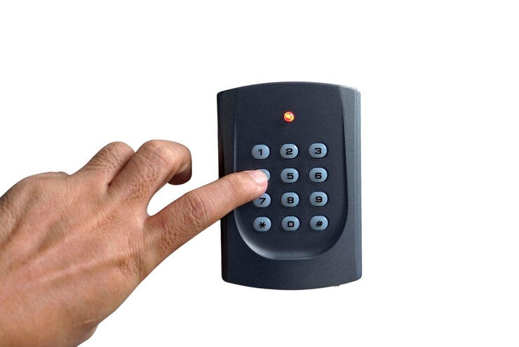 PSD close up the hand is pressing the number four button on the keypad and the yellow led light on psd