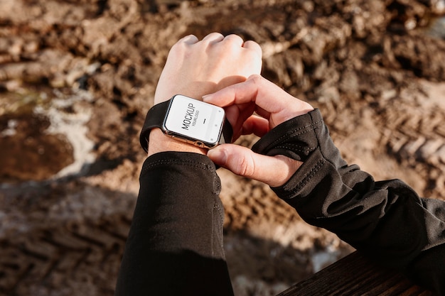 Close up hand wearing watch mockup