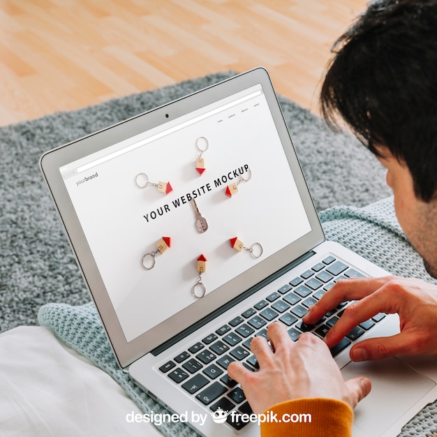 close up of man using laptop