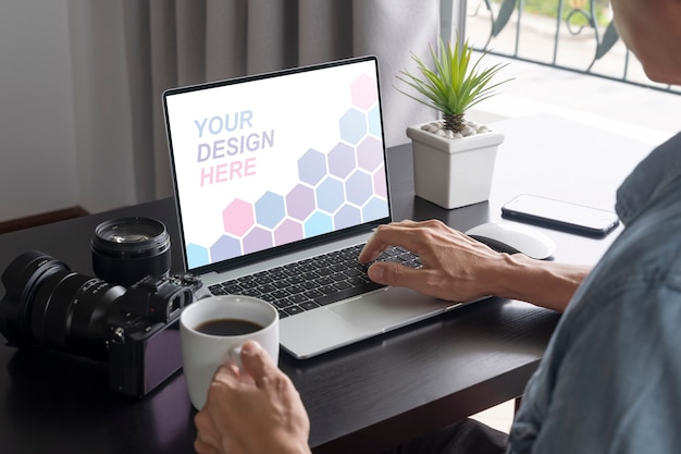 Close up on man working from home on laptop mockup