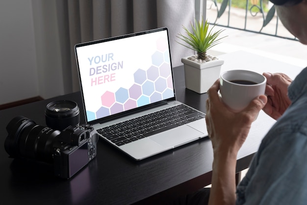 Close up on man working from home on laptop mockup