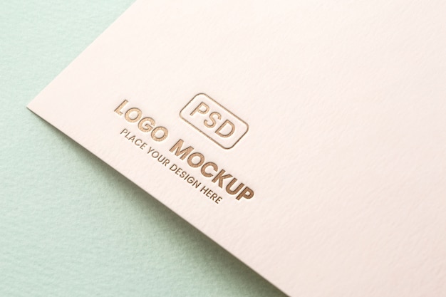 Close-up of paper pressed logo mock-up