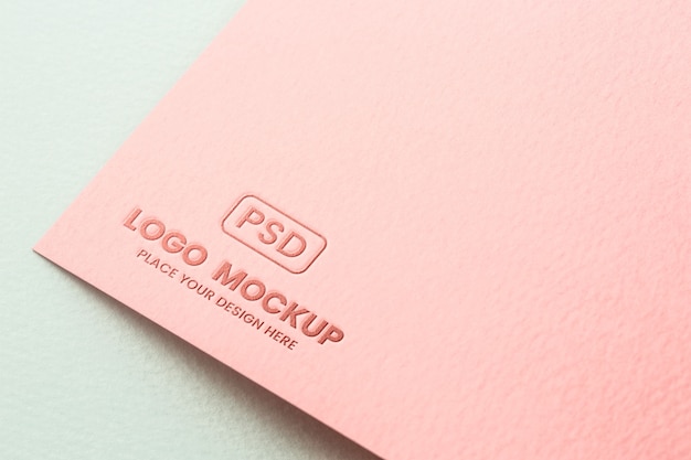 Close-up of paper pressed logo mock-up