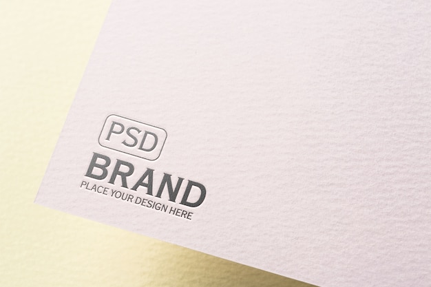 Close-up of paper pressed logo mock-up