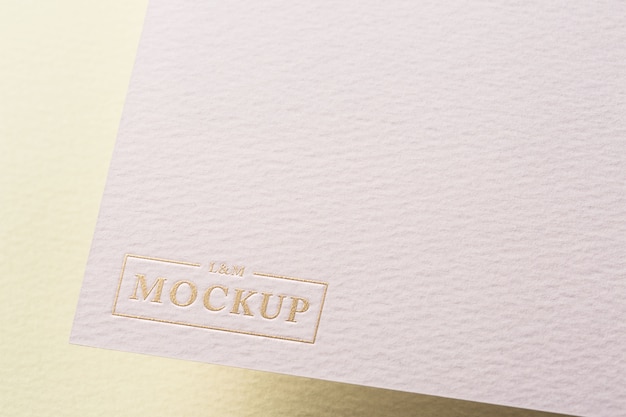 PSD close-up of paper pressed logo mock-up