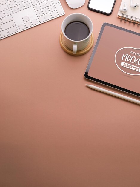 PSD close up of pink workspace with digital tablet mockup