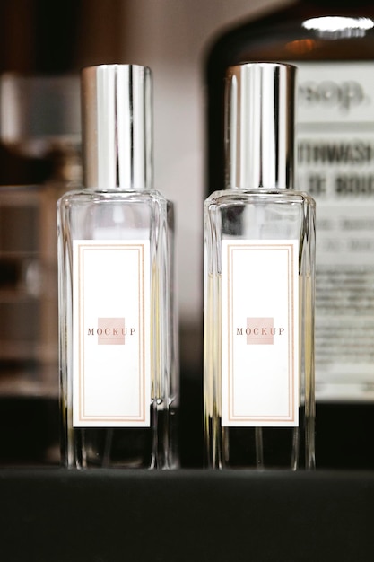 Close up of pray perfume bottles mockup