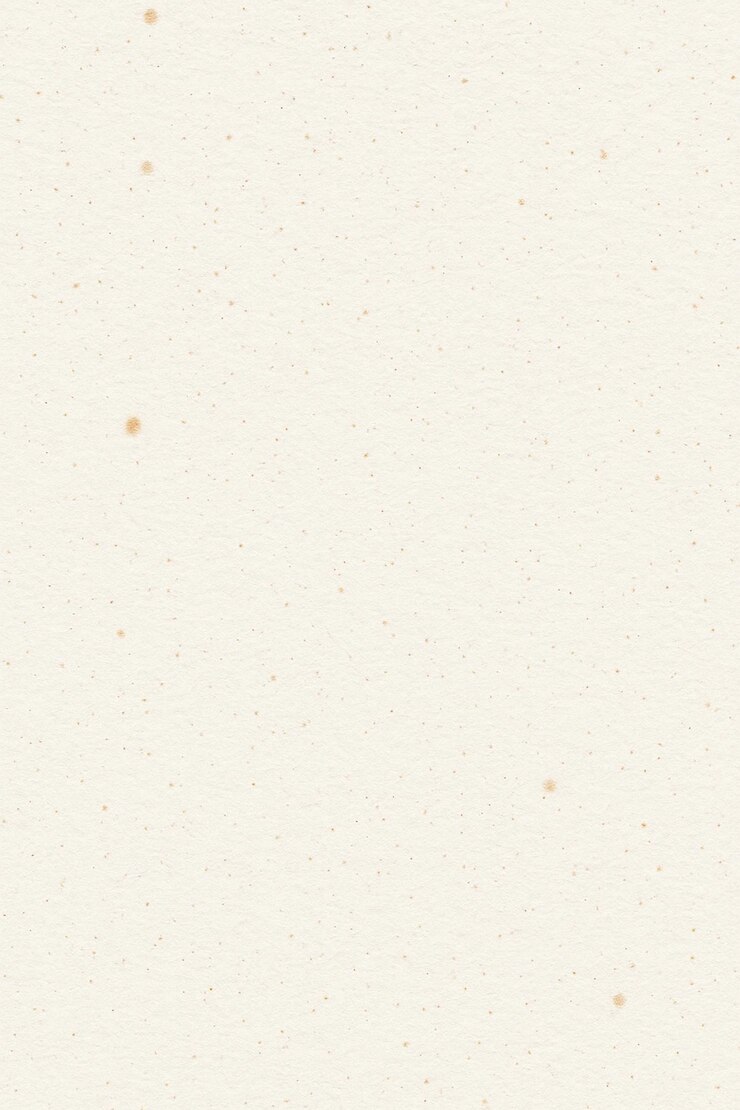 PSD close-up of a textured creamy beige paper with small speckles and a worn appearance