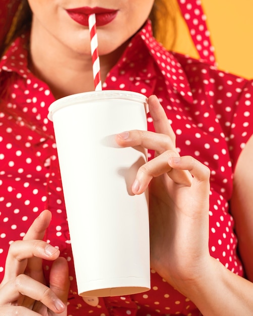 Close up woman holding cup