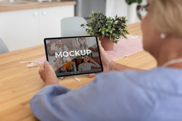 Close up woman holding tablet