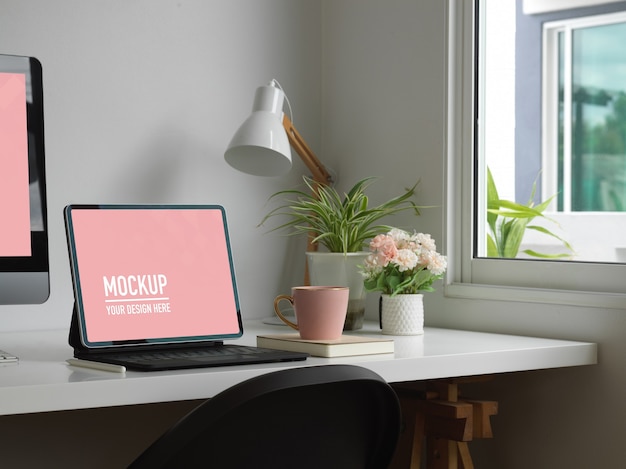 Close up of workspace with digital tablet mockup