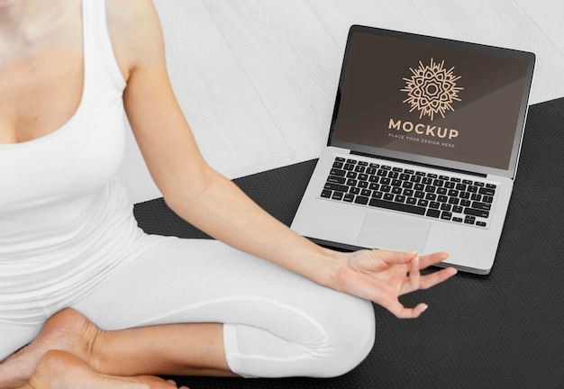 PSD close up yoga branding with laptop