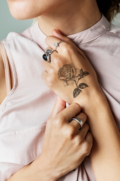 Closeup of hand tattoo of a woman