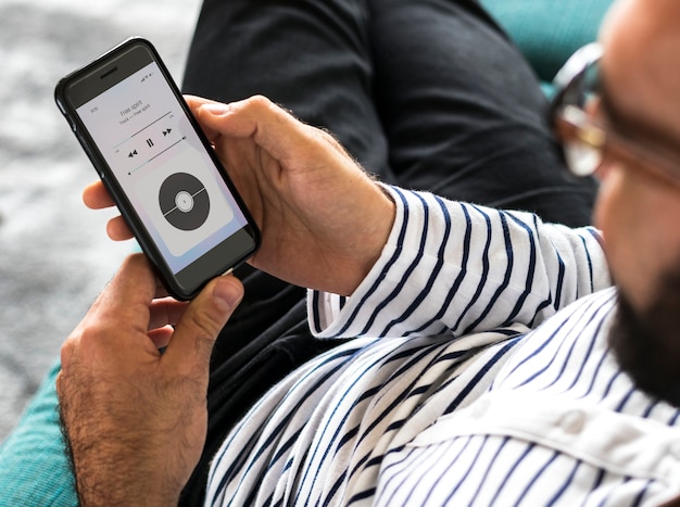 closeup of a man streaming music