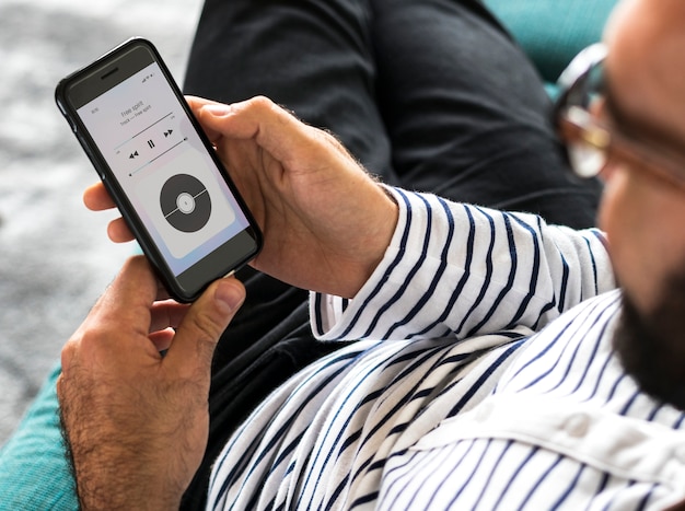 Closeup of a man streaming music