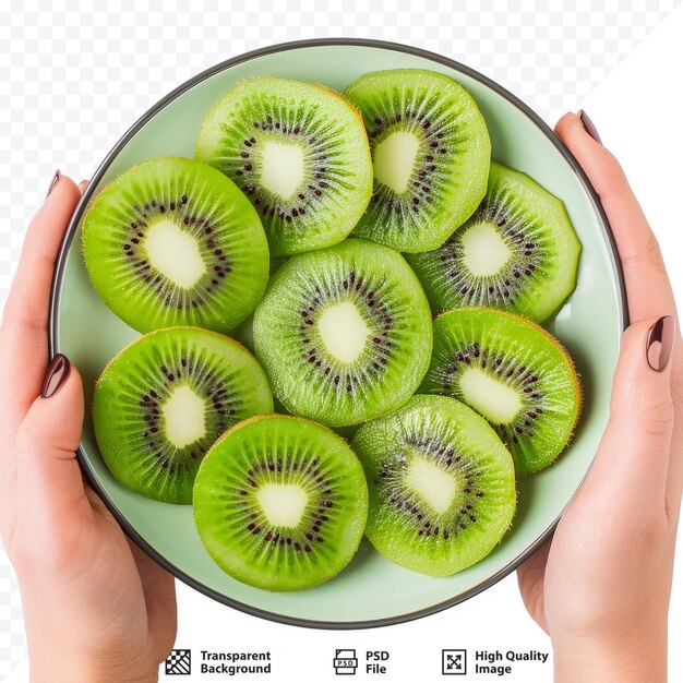 PSD closeup of plate in female hands girl woman eating slices of kiwi tropical fruit isolated on white healthy diet and nutrition studio shot