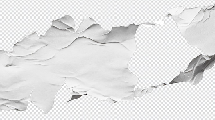 PSD closeup of a white ripped piece of paper for creative backgrounds and textures