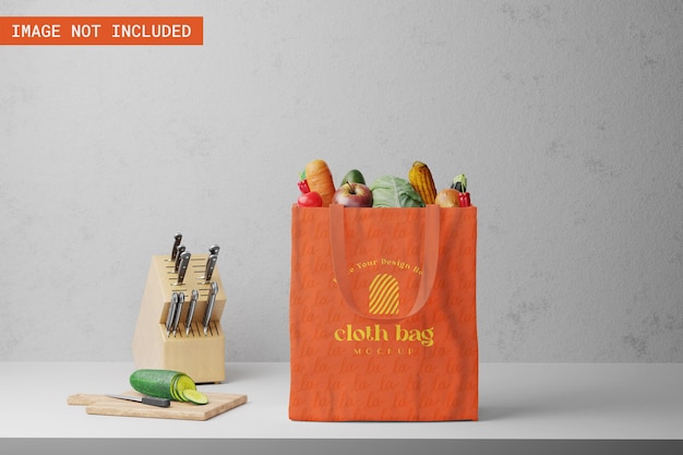 PSD Макет тканевой сумки или макет большой сумки с овощами и ломтиками огурца