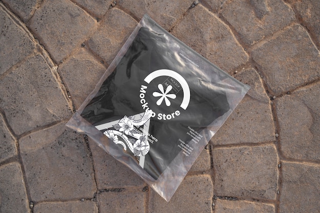 PSD clothes in transparent bag mockup