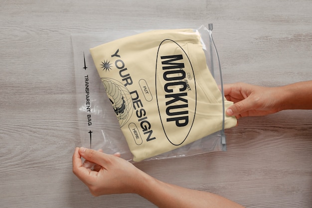 PSD clothes in transparent bag mockup