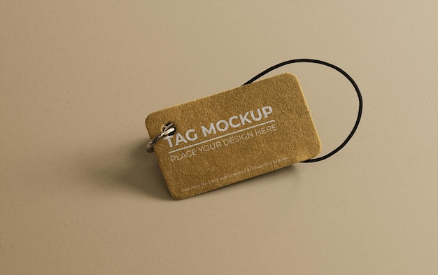 clothing label tag mockup on a beige surface
