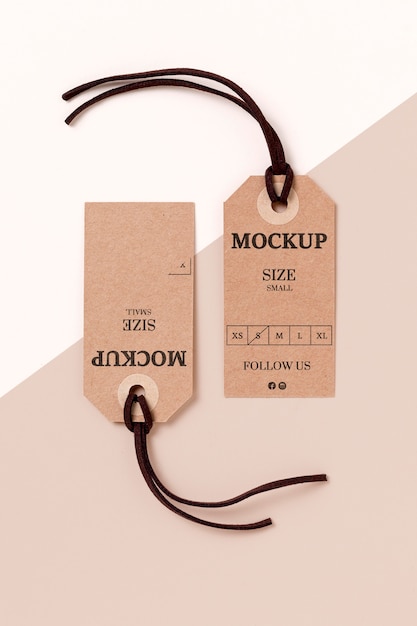 clothing size tag mock-up on white and pink background