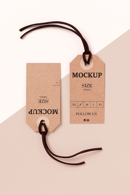 Clothing size tag mock-up on white and pink background