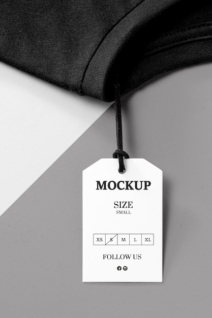 Clothing size white mock-up and black towel